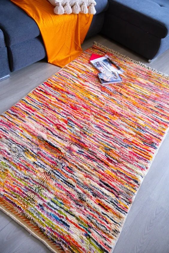 Tapis berbère Mrirt orangé intense laine soyeuse salon luxe - Taknaj